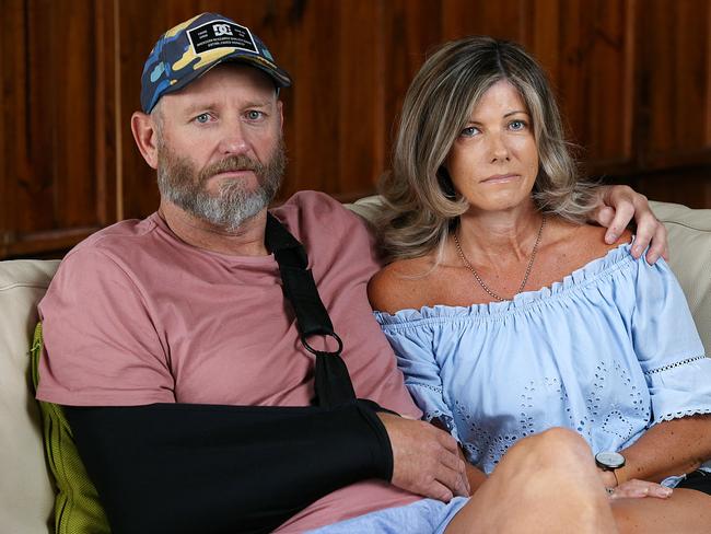 Former AFL footballer John Barnes at home in Essendon with his wife Rowena. Picture: Ian Currie