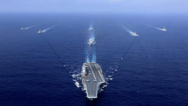 A Chinese aircraft carrier sailing during a drill at sea. Picture: AFP