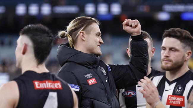 Darcy Moore celebrates the Magpies’ victory over Geelong on Friday night. Picture: Darrian Traynor/Getty Images