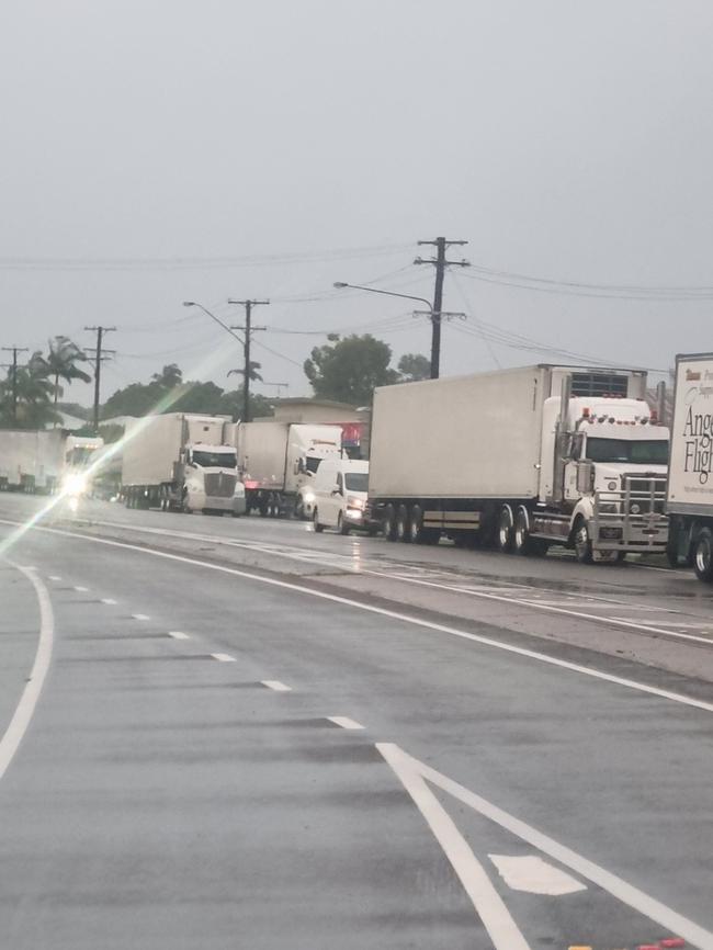 Traffic lines up following the closure of the Bruce Highway between Ingham and Cardwell.