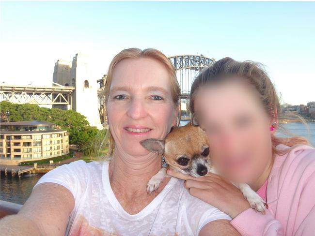 Maree Mavis Crabtree, a Gold Coast mother who has been charged with murdering two of her children and gaining financial benefit from their insurance payouts. Seen here with one of surviving daughters in Sydney.