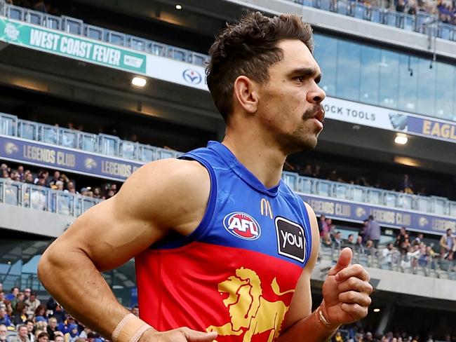 PERTH, AUSTRALIA - JULY 14: Charlie Cameron of the Lions runs out onto the ground during the 2024 AFL Round 18 match between the West Coast Eagles and the Brisbane Lions at Optus Stadium on July 14, 2024 in Perth, Australia. (Photo by Will Russell/AFL Photos via Getty Images)