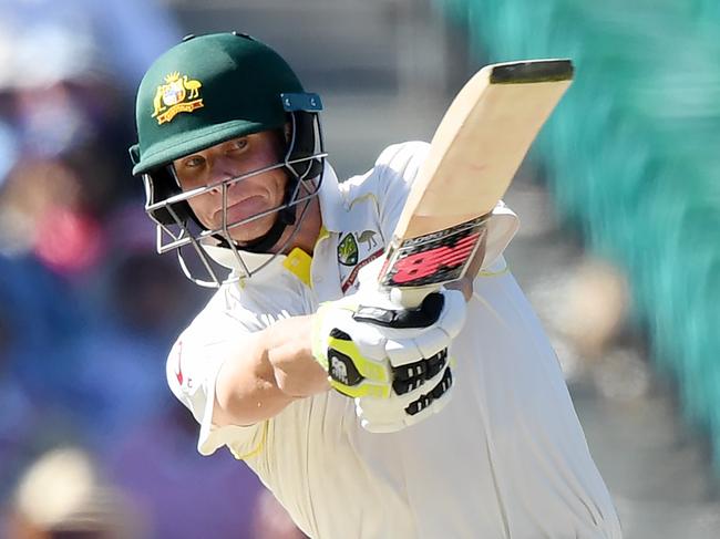 Australia's Steve Smith hits a four during Day 2 of the Fifth Test cricket match between Australia and England at the Sydney Cricket Ground (SCG) in Sydney, Friday, January 5, 2018. (AAP Image/David Moir) NO ARCHIVING, EDITORIAL USE ONLY, IMAGES TO BE USED FOR NEWS REPORTING PURPOSES ONLY, NO COMMERCIAL USE WHATSOEVER, NO USE IN BOOKS WITHOUT PRIOR WRITTEN CONSENT FROM AAP