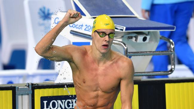 Mitch Larkin celebrates winning the men’s 50m backstroke.