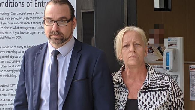 Defence lawyer Calvin Gnech with Yatala police officer Tammy Ann Bruce, 49, who assaulted a 13-year-old girl at the Beenleigh Watchhouse. Picture: Alex Treacy