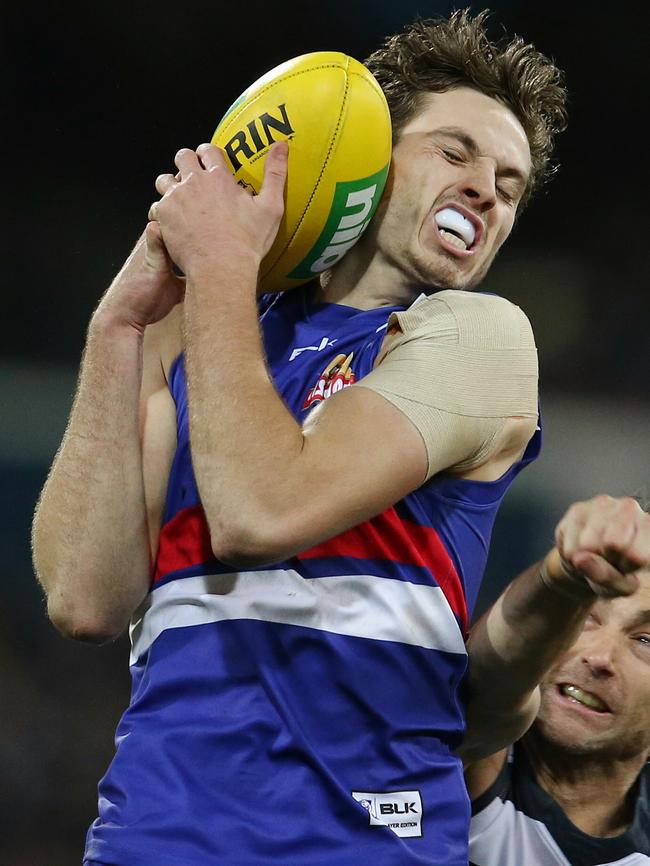 Zaine Cordy marks against Corey Enright. Picture: Michael Klein