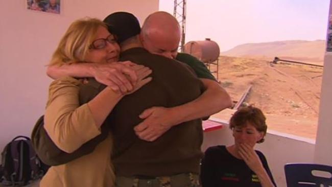 Scott and Julia Dyball finally meet Ashley in war-torn Syria, with Michele Harding — whose son Reece was killed there in July. Picture: 60 Minutes
