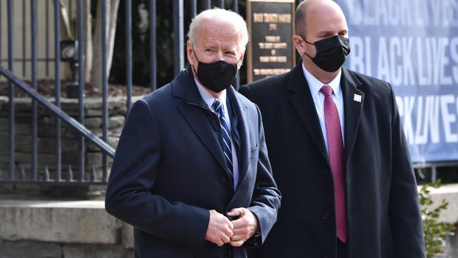 US President Joe Biden, left, leaves Holy Trinity Catholic Church in the Georgetown neighborhood of Washington, DC. Picture: AFP