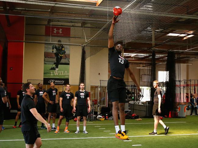French university student, 212cm-tall Stanislas Heili (right) watches Derrick Williams practice ruck work during the AFL US Combine. Picture: AFL Media