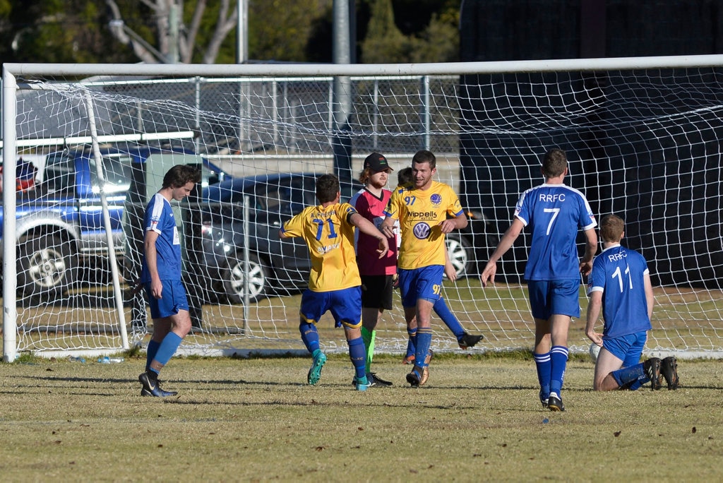 Aaron Wieden (#97) celebrates the opening goal for USQ FC against Rockville in Toowoomba Football League Premier Men round 14 at Captain Cook Reserve Des McGovern oval, Sunday, June 24, 2018. Picture: Kevin Farmer