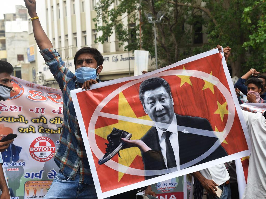 Activists in India protest against China’s leader after Indian and Chinese troops clashed over disputed territory. Picture: Sam Panthaky/AFP