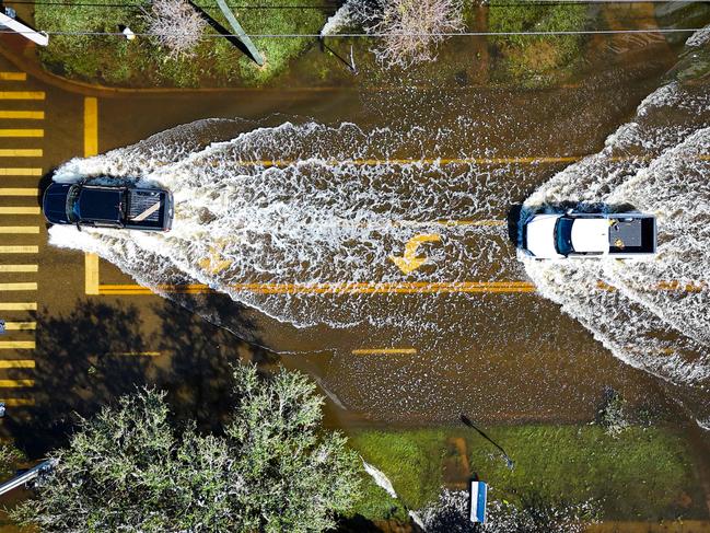 Vehicles drive through flood waters in the aftermath of Hurricane Milton in Lake Maggiore, Florida, on October 10, 2024. Picture: AFP