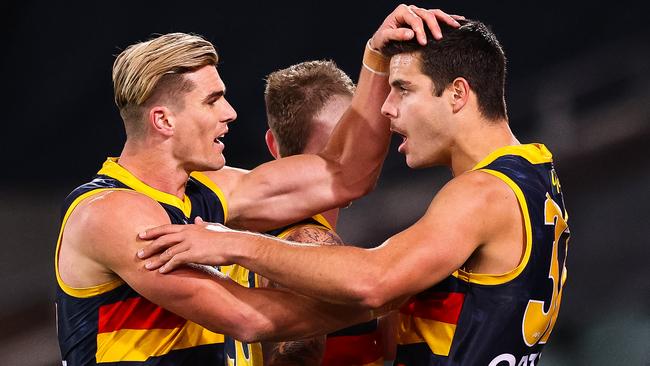 Ben Keays and Darcy Fogarty celebrate a goal during the Crows’ loss to Melbourne.