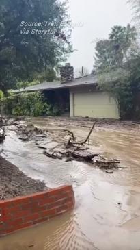 Mud and debris litter Los Angeles' Studio City as heavy rain continues