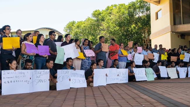 Hundreds gathered at CDU to show their support for an international student who was left in critical condition following a home invasion. Pic: Pema Tamang Pakhrin