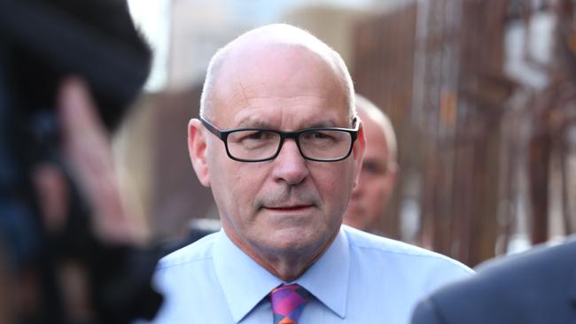 Magistrate Bob Harrap walks into the Adelaide Magistrates Court for his first appearance since being charged with corruption offences. Picture: Tait Schmaal