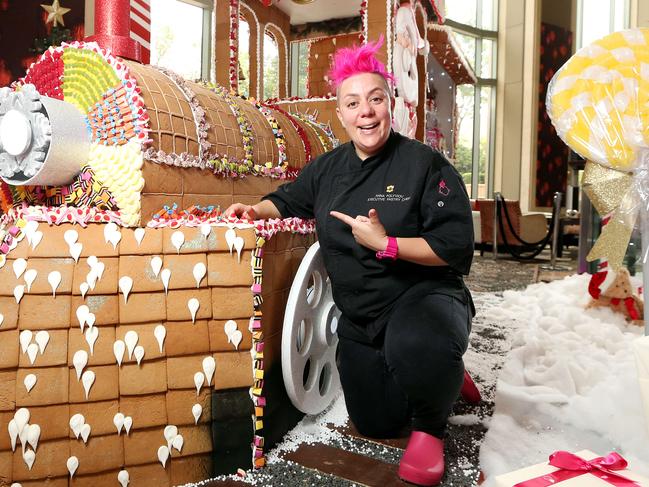 Anna Polyviou with her four-metre long gingerbread train at the Shangri-La Hotel in Sydney. Picture: Tim Hunter.