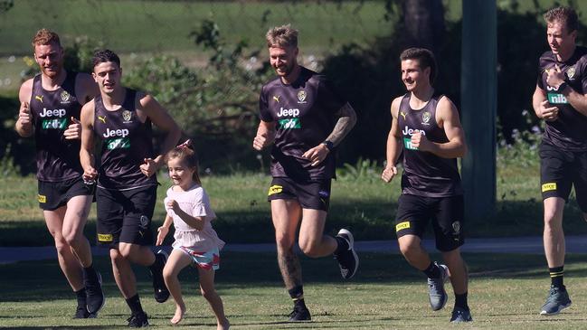 Trent Cotchin’s oldest daughter Harper makes the most of the time with her dad. Picture: Michael Klein.