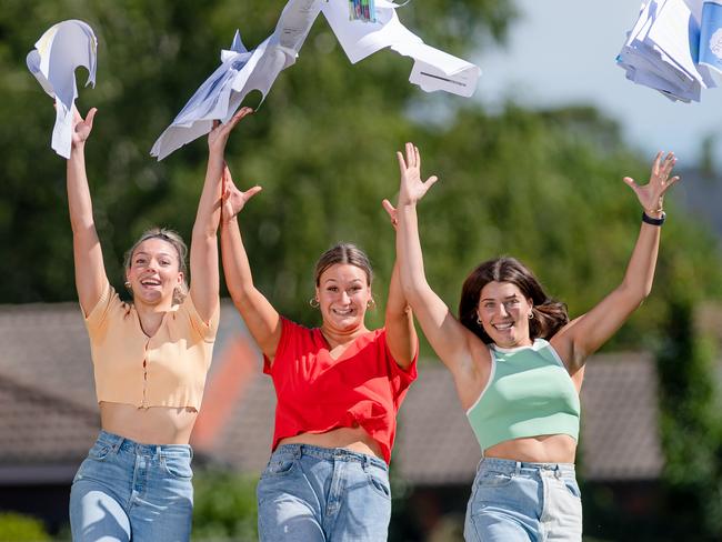 Julia Gnocato, 17, (in green), Zoe Jenkins, 18, (in yellow) and Rhi Ockwell, 18, (in red) The friends celebrating the end of exams finally after the most challenging VCE year yet. Picture: Jason Edwards