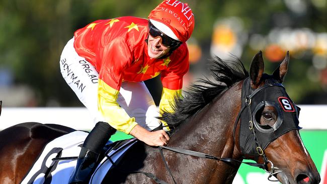 Jockey Hugh Bowman returns to the mounting yard after riding Hightail to victory in Race 7, the Quincy Seltzer Handicap, during Royal Randwick Raceday at Royal Randwick Racecourse in Sydney, Saturday, May 2, 2020. (AAP Image/Dan Himbrechts) NO ARCHIVING, EDITORIAL USE ONLY