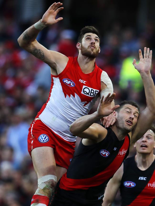 Sam Naismith jumps over Tom Bellchambers. Picture: Michael Klein