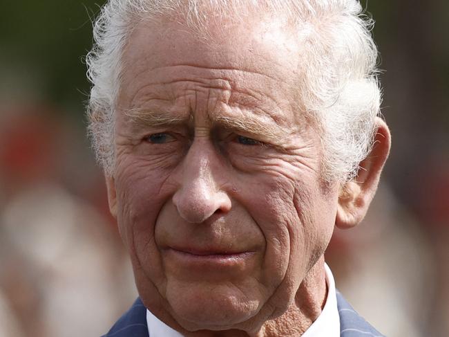 (FILES) Britain's King Charles III looks on during an official welcoming ceremony at the Arc de Triomphe in Paris on September 20, 2023, on the first day of a state visit to France. Britain's King Charles III has been diagnosed with a "form of cancer" according to a statement released by Buckingham Palace on February 5, 2024. (Photo by Yoan VALAT / POOL / AFP)