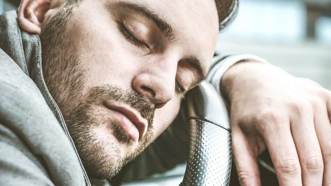 A drunk-driver found asleep at the wheel had been downing beers with his workmates at a surgery farewell bash. Generic picture