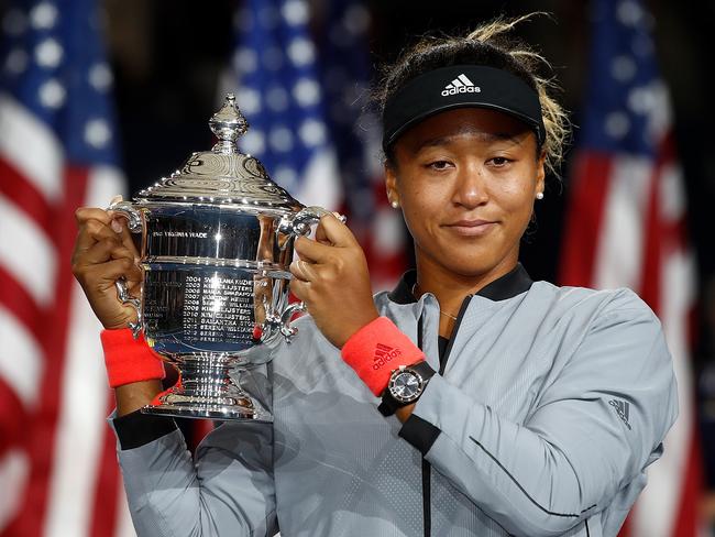 Naomi Osaka with her US Open trophy. Picture: Getty Images/AFP