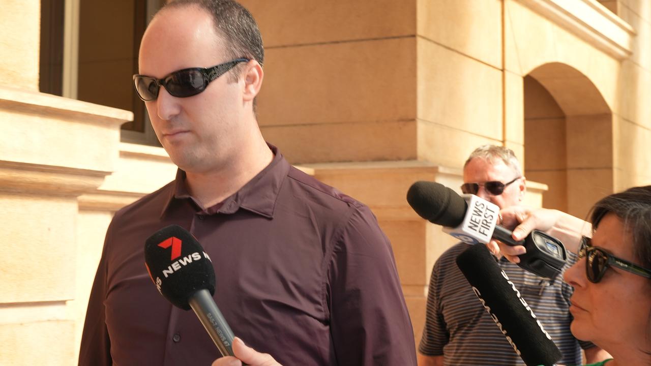 Matthew Hollitt leaving court after hearing how crashing his car into a motorcycle rider changed her life and traumatised her. Picture: NewsWire / Dean Martin