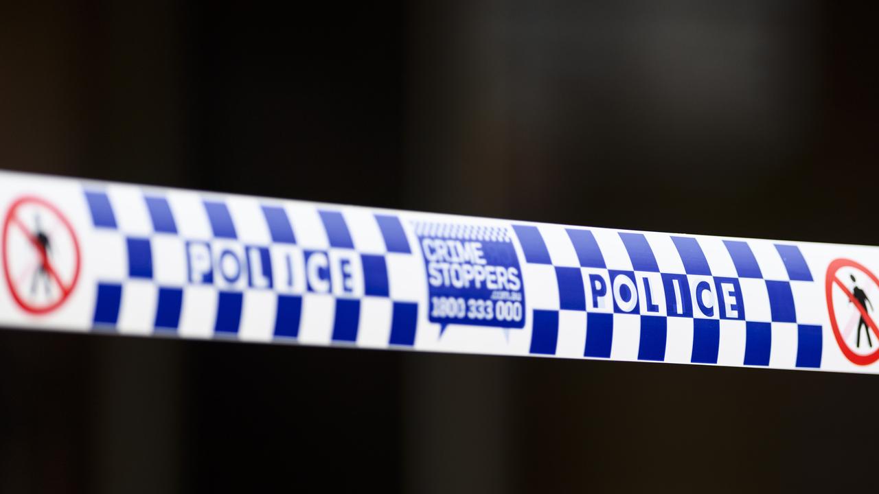 Woman on the run after stabbing in Bushland Beach