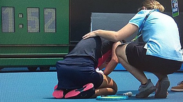 Slovenian Dalila Jakupovic had to abandon her match against Switzerland's Stefanie Voegele when she collapsed at the Kooyong Classic in Melbourne. Source: ESPN