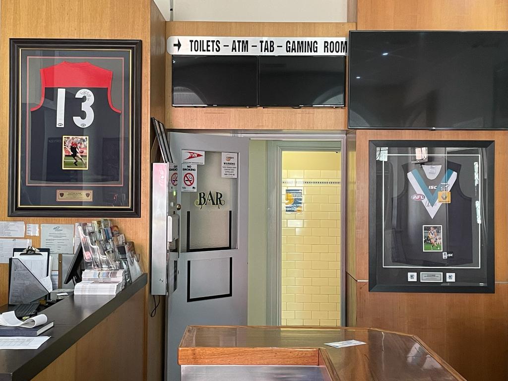 The Echuca Hotel main bar, which has signed guernseys of ex-locals and Brownlow Medal favourites Ollie Wines and Clayton Oliver hanging near each other. Picture: David Connally