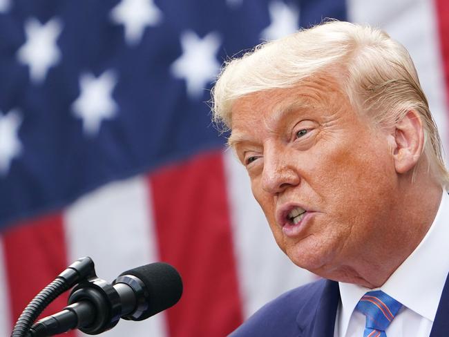 (FILES) In this file photo US President Donald Trump speaks on COVID-19 testing in the Rose Garden of the White House in Washington, DC on September 28, 2020. - Donald Trump suffered another blow on October 7, 2020 in his battle to prevent New York prosecutors from obtaining his tax returns, meaning the dispute is likely heading to the Supreme Court for a second time. Three federal appeal court judges dismissed the US president's request to block a subpoena of documents held by the accountancy firm Mazars, which handles his taxes. (Photo by MANDEL NGAN / AFP)