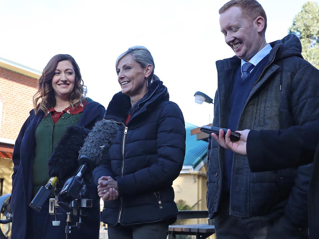 Celia Pacquola, left, Arts Minister Elise Archer and Luke McGregor speaking to the media about the production of Rosehaven season 3. Picture: LUKE BOWDEN