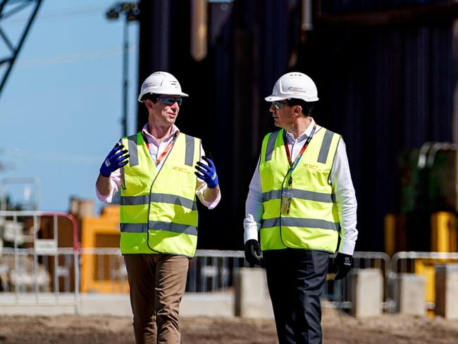 Osborne shipyard rises from the dust at Port Adelaide - visiting the construction site Finance Minister Simon Birmingham with Naval Group global chief executive Pierre Eric Pommellet -  ANI graduate Engineer Matthew Stokes with Laing OÃRourke Graduate Site Engineer Vivian Phan, Saturday February 27, 2021 - pic Mike Burton