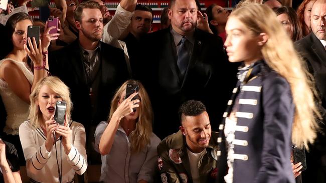 Front row of the #TOMMYNOW Women’s Fashion show at New York Fashion week in 2016, just two seats down from musician Taylor Swift. Photo: Neilson Barnard/Getty Images