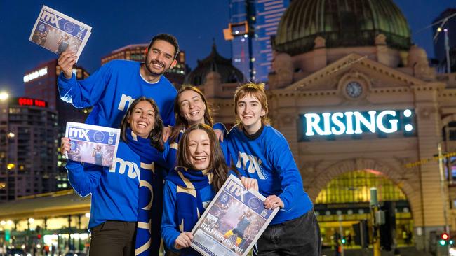 mX is back for two special editions, thanks to arts festival Rising. Liana, Mataeo, Mathilda, Saskia and Chelsea prepare to hand out the papers. Picture: Jason Edwards