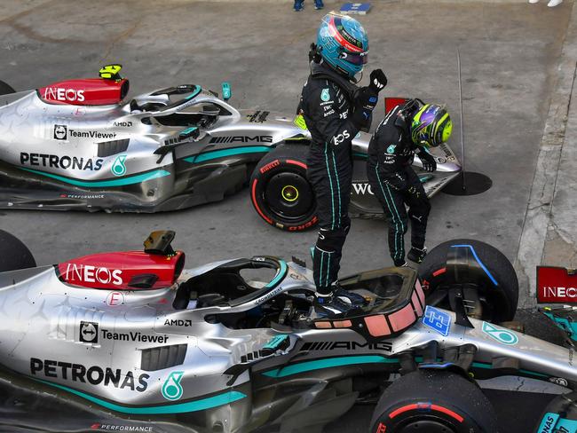 Mercedes' British driver George Russell (C) celebrates after winning the sprint qualifying to obtain the pole position at the Autodromo Jose Carlos Pace racetrack. Picture: NELSON ALMEIDA / AFP)