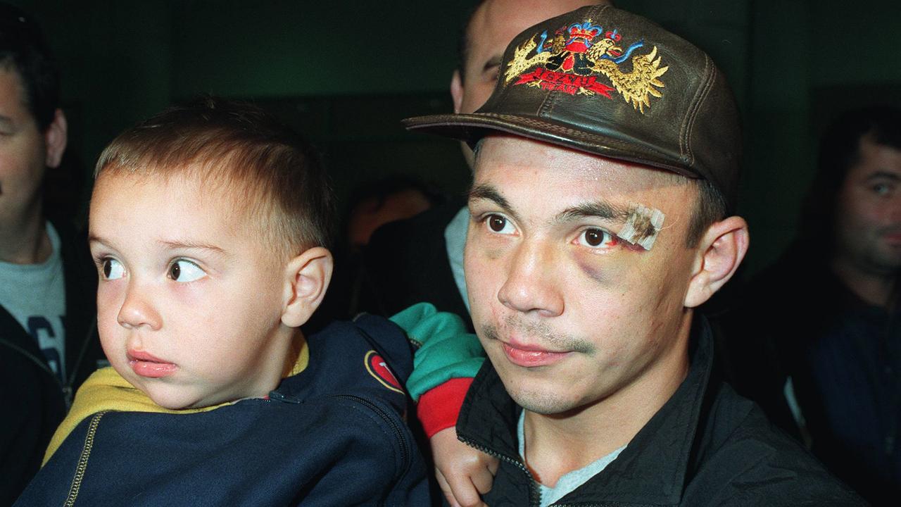 Kostya Tszyu and a young Tim pictured at Sydney Airport in 1997. Picture: Uwe Kuessner