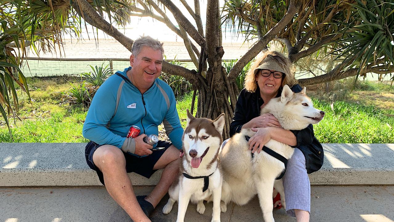 Gerard and Noelle Hall with their fur babies Lokki and Isla at Surfers Paradise. Picture Jenny Masters