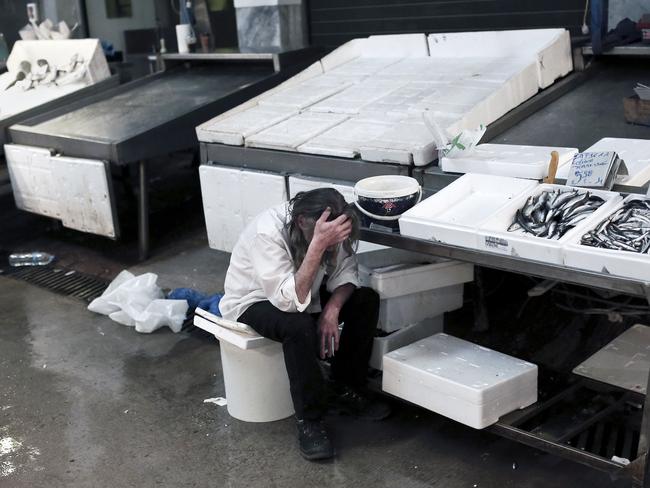 A lonely scene at a central Athens fish market. Picture: Angelos Tzortzinis / AFP