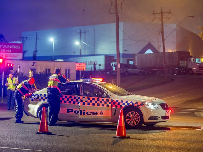 Police at the scene of the fatal crash on the corner of Whitehall St and Somerville Rd. Picture: Gary Sissons.