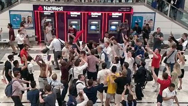 ‘It’s Coming Home’ - England Fans Celebrate Win Over Colombia in London’s Liverpool Street Station