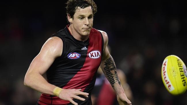 Essendon Bombers player Jake Carlisle chases the ball against the Western Bulldogs during round 18 of the AFL at Etihad Stadium in Melbourne, Sunday, Aug 2, 2015. (AAP Image/Julian Smith) NO ARCHIVING, EDITORIAL USE ONLY\\