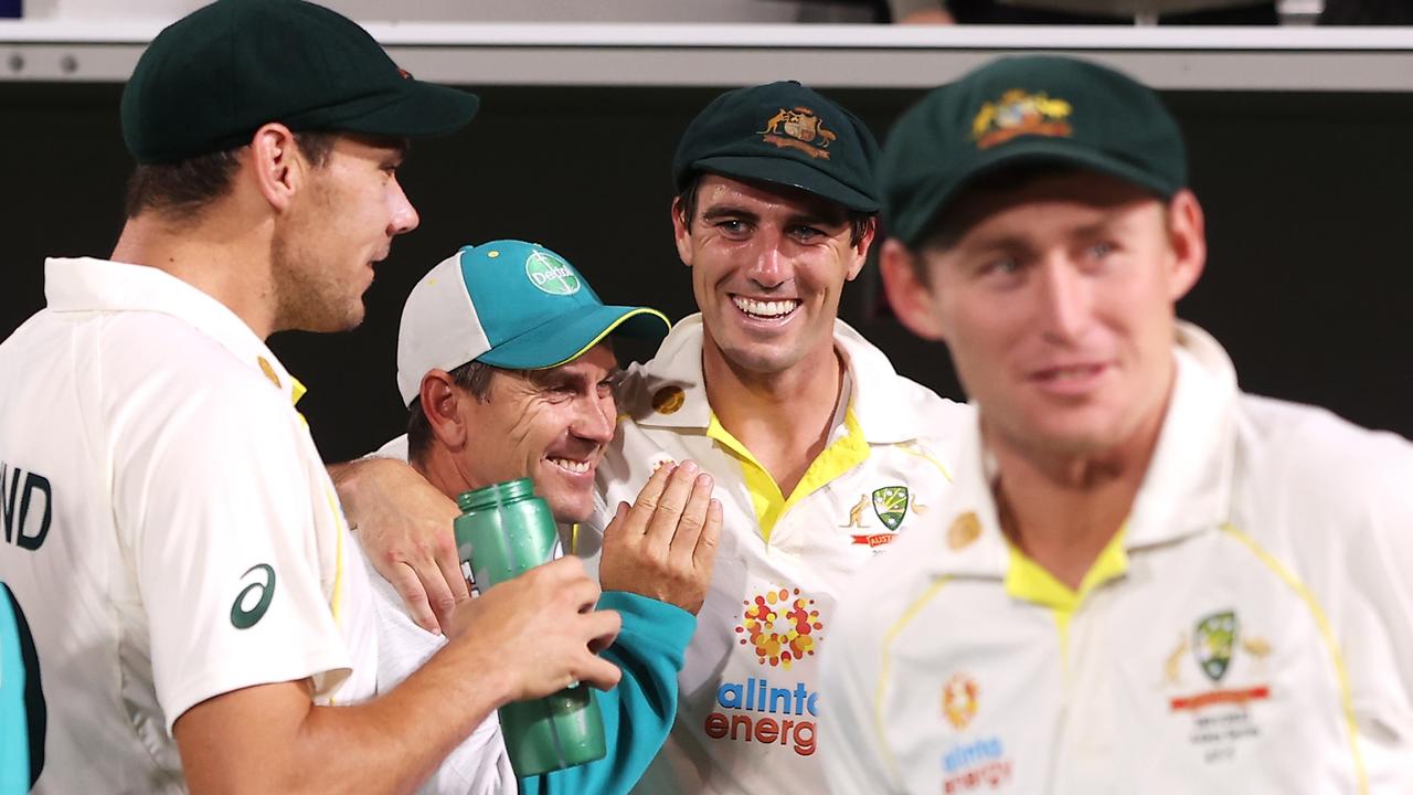 Australian coach Justin Langer and captain Pat Cummins celebrate winning the Ashes. Picture: CA/Cricket Australia via Getty Images