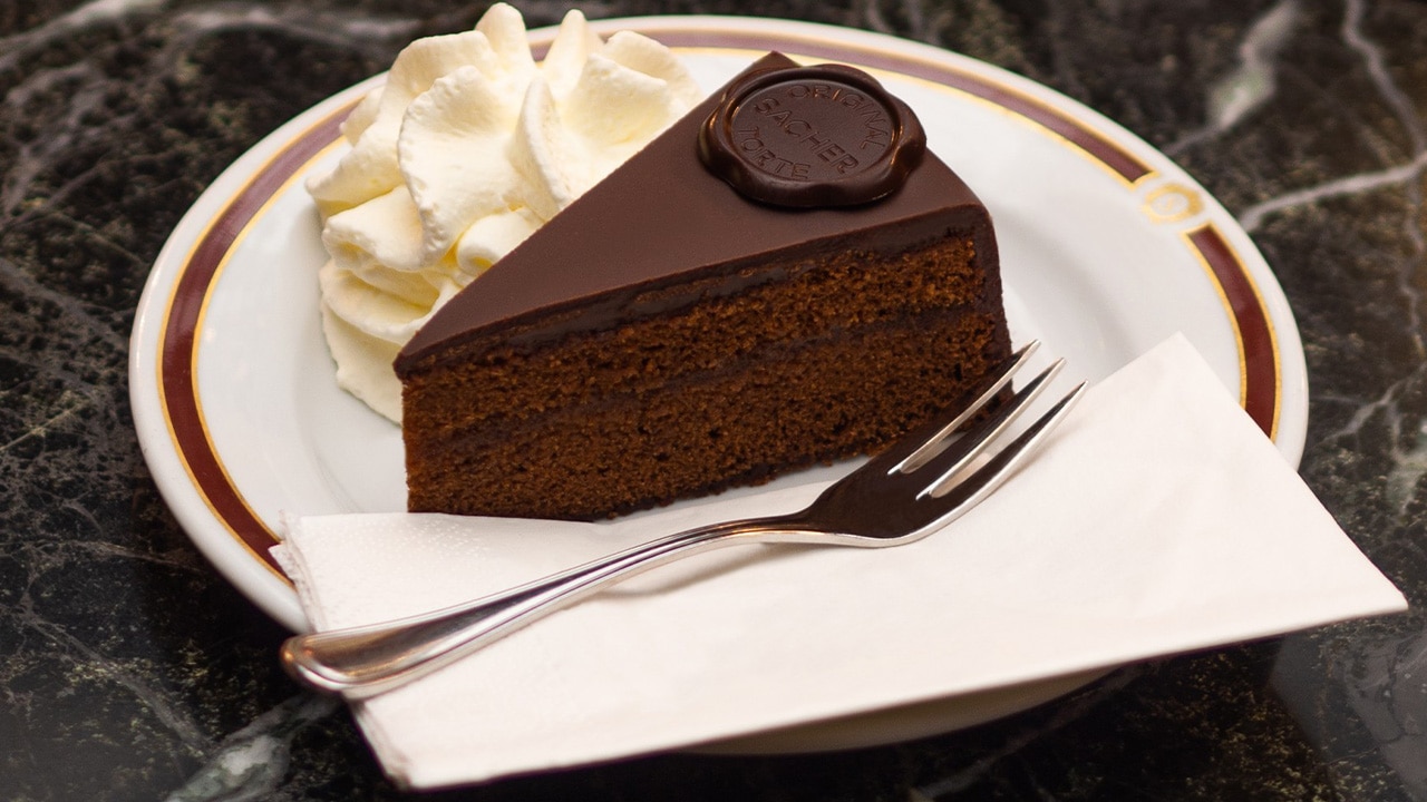 <h2>Best dessert</h2><p>It&rsquo;s difficult (and ill-advised) to go past a cake that is widely recognised as one of Austria&rsquo;s gastronomic crowning achievements. Take a seat in the opulent <a href="https://www.sacher.com/en/restaurants/cafe-sacher-wien/" target="_blank" rel="noopener">Caf&eacute; Sacher</a>, on the right bank of the Salzach river, and say bitte to a serve of its Sachertorte, the cake that was invented at its sister property, the <a href="https://www.sacher.com/en/vienna/" target="_blank" rel="noopener">Hotel Sacher</a> in Vienna, in 1832. There&rsquo;s every chance all the luxurious red velvet and dark polished wood of the dining room will keep you glued to your seat, so don&rsquo;t miss the Salzburger nockerl (a sweet fluffy egg souffl&eacute;) paired with a macchiato &ndash; this is Salzburg&rsquo;s celebrated coffee culture at its finest.</p>