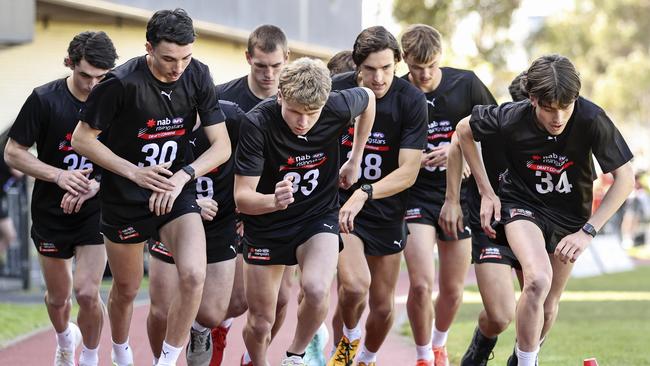 Players complete the 2km time trial during the 2022 AFL Draft Combine. Picture: Getty Images