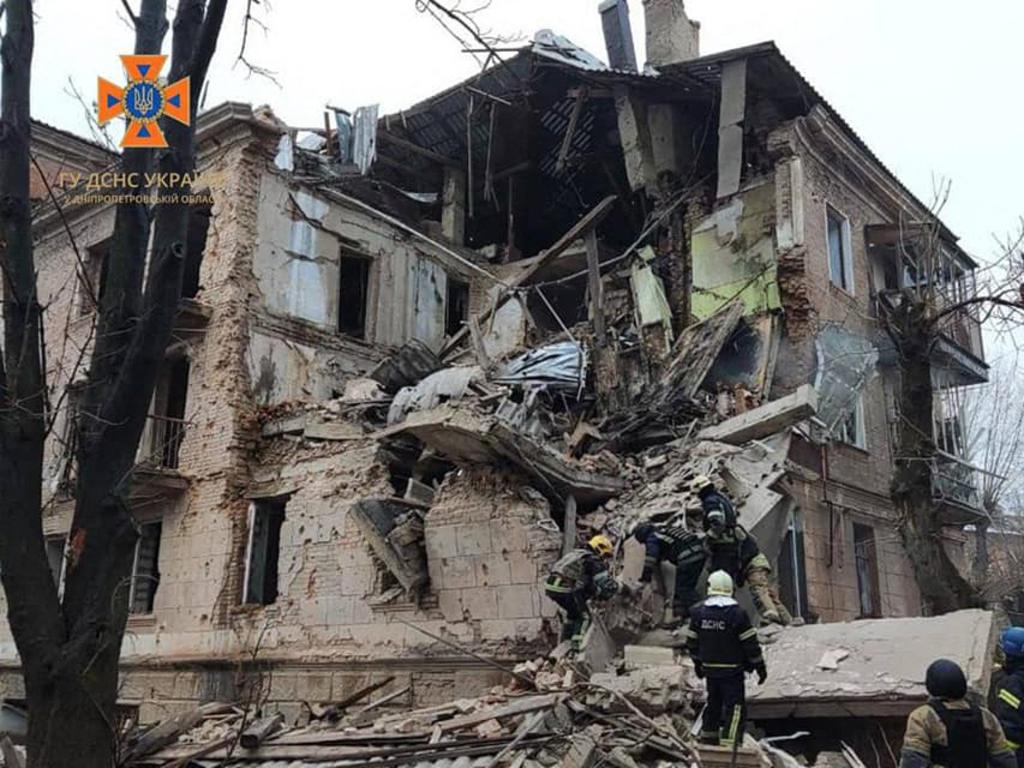 Rescuers working at a three-store building heavily damaged following a Russian missile strike in Ukrainian city of Kryvyi Rih. Picture: AFP