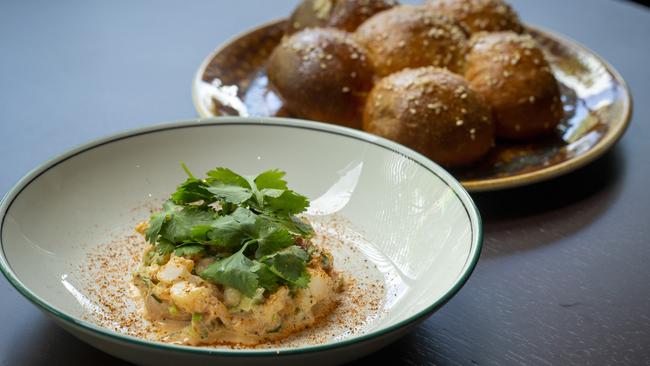 Buttery and delicious: Devilled Moreton Bay bug with garlic bread. Picture: Wayne Taylor