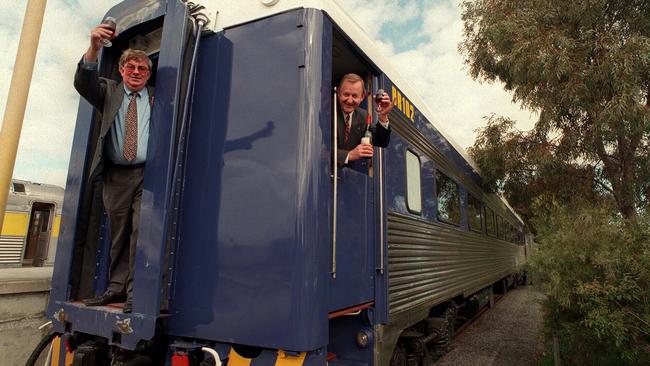 Bluebird Rail System chief executive Barry Martin with Barossa Valley economic development authority director Brian Sincock aboard a Bluebird train.